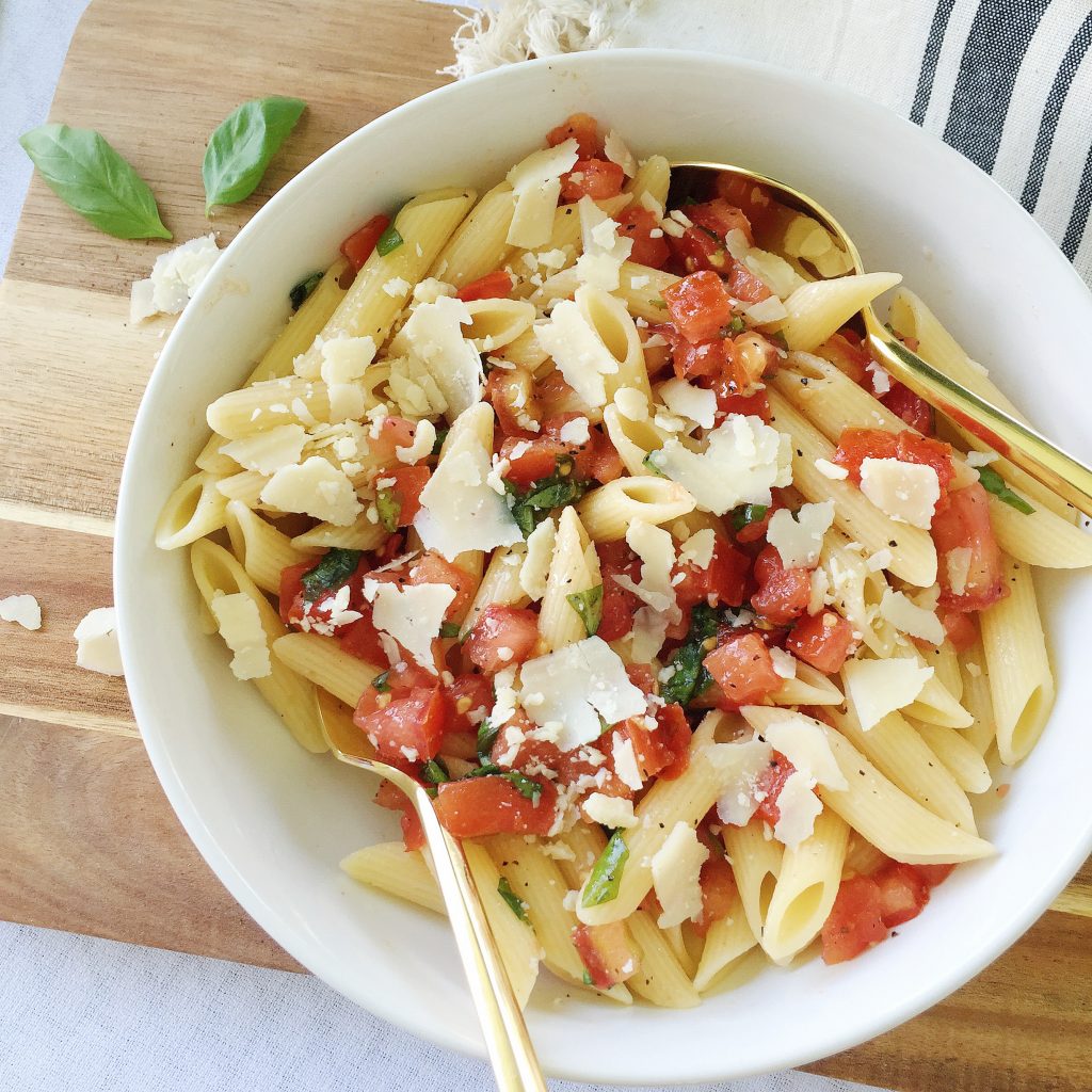 Easy summer pasta recipe with penne, tomatoes basil and fresh parmesan - jane at home #food #dinner #vegetarian #ideas #lunch #easy #pasta #salad